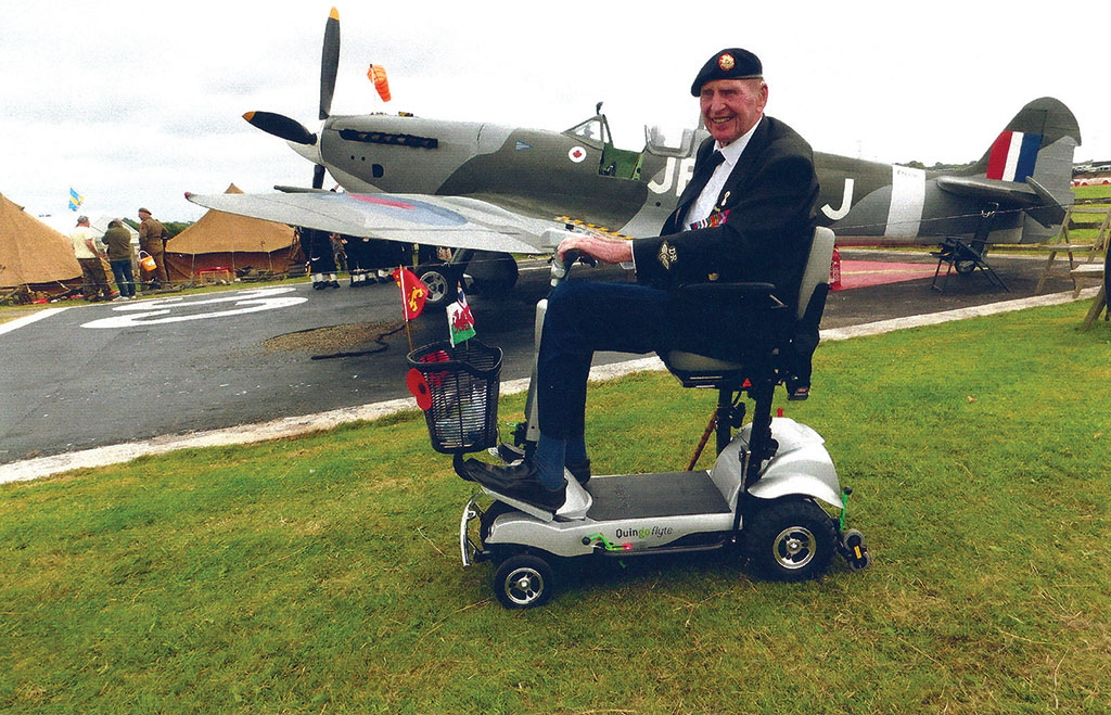 Gordon Prime on his Quingo Flyte in front of a Spitfire